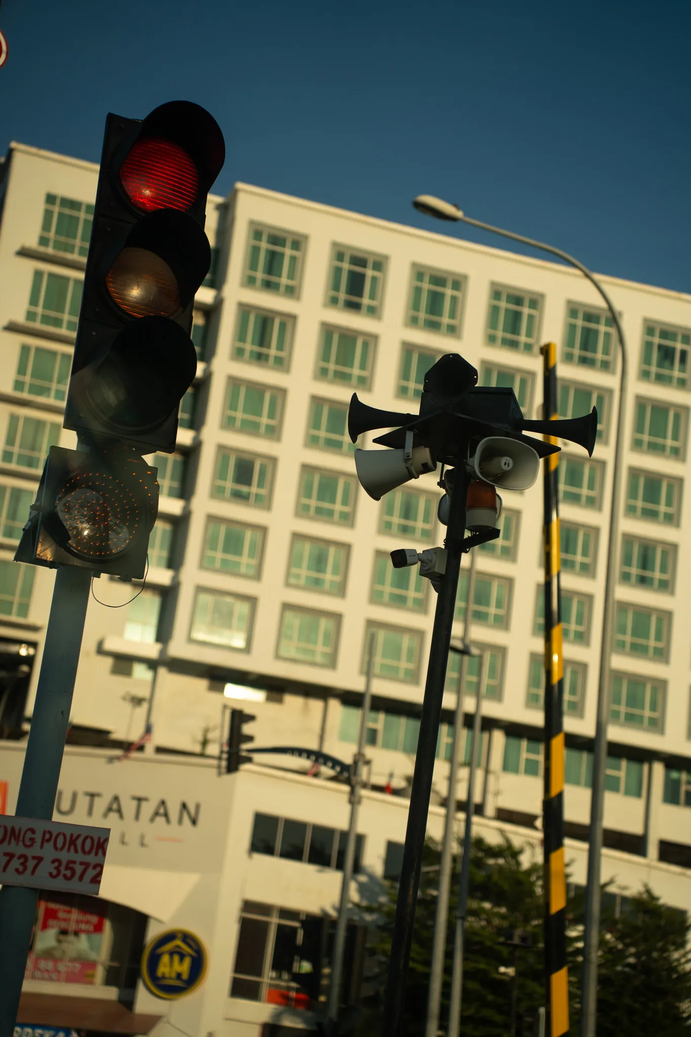 Traffic light and roadside equipment in an urban setting